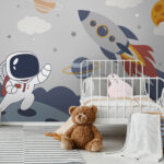 Wall murals Cartoon an astronaut walking on a planet with a rocket in the sky