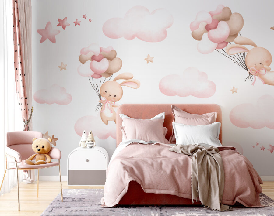 Group of pink clouds and a bunny holding balloons