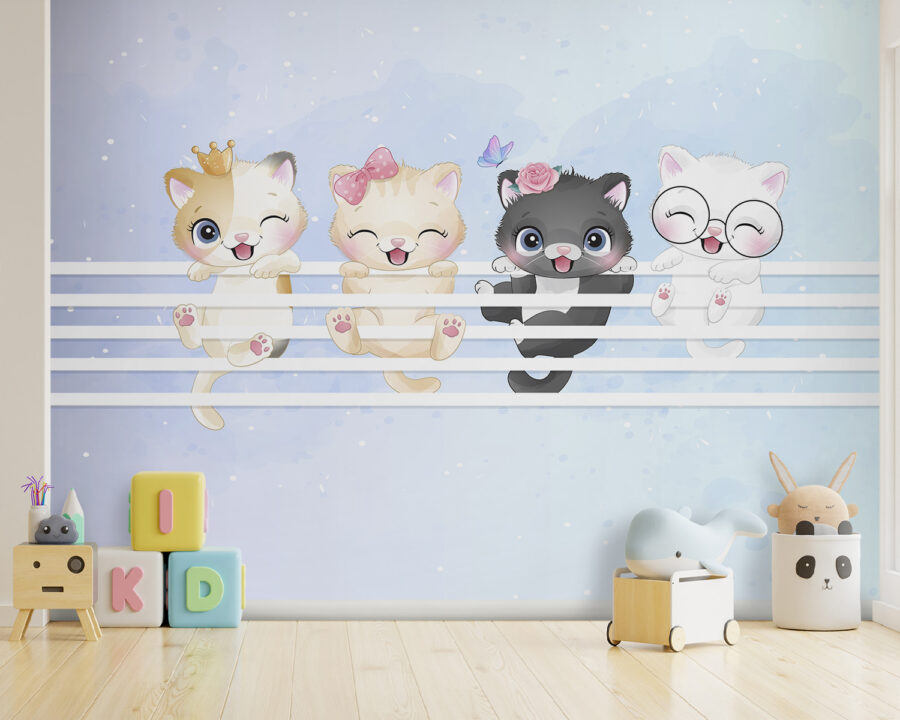 Group of kittens on a white fence Group of kittens on a white fence