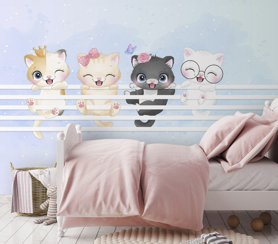 Group of kittens on a white fence Group of kittens on a white fence