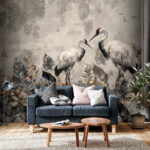 Wall murals Couple of cranes standing in a field of leaves