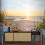 Wall murals Beach with grass and a body of water