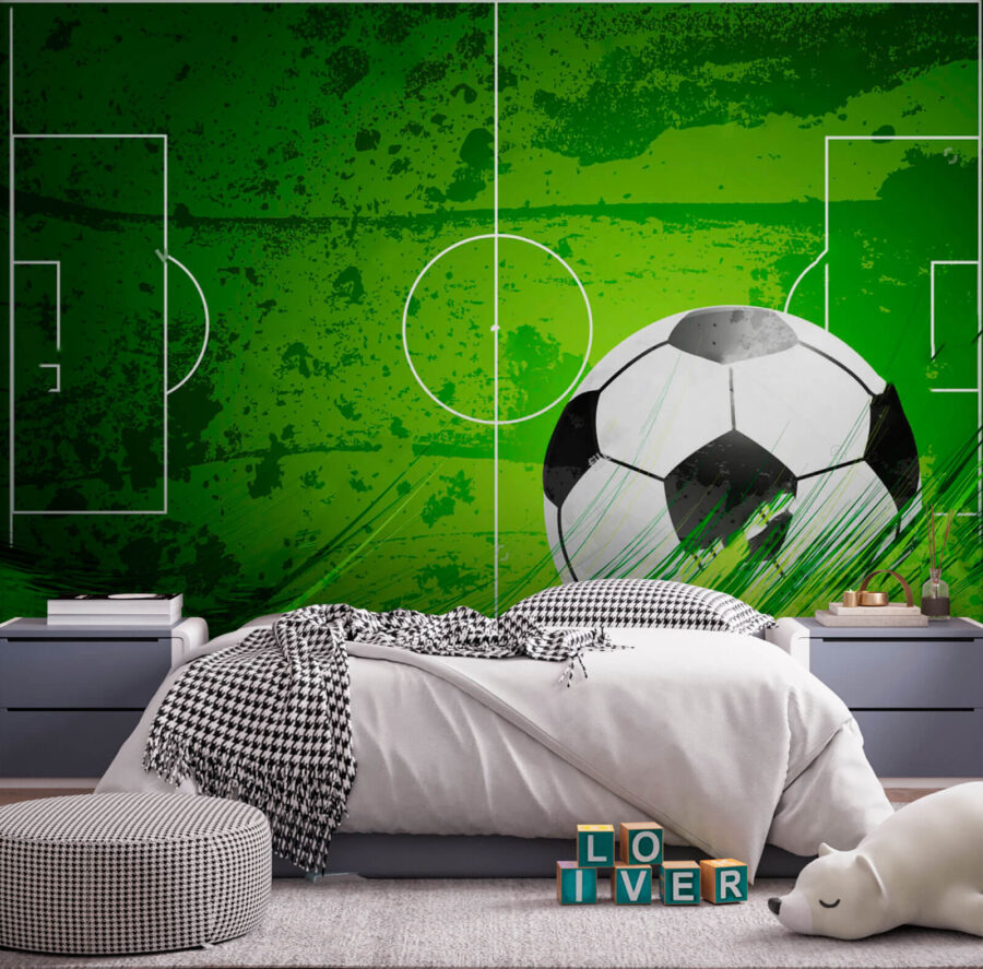 Football ball on a green field