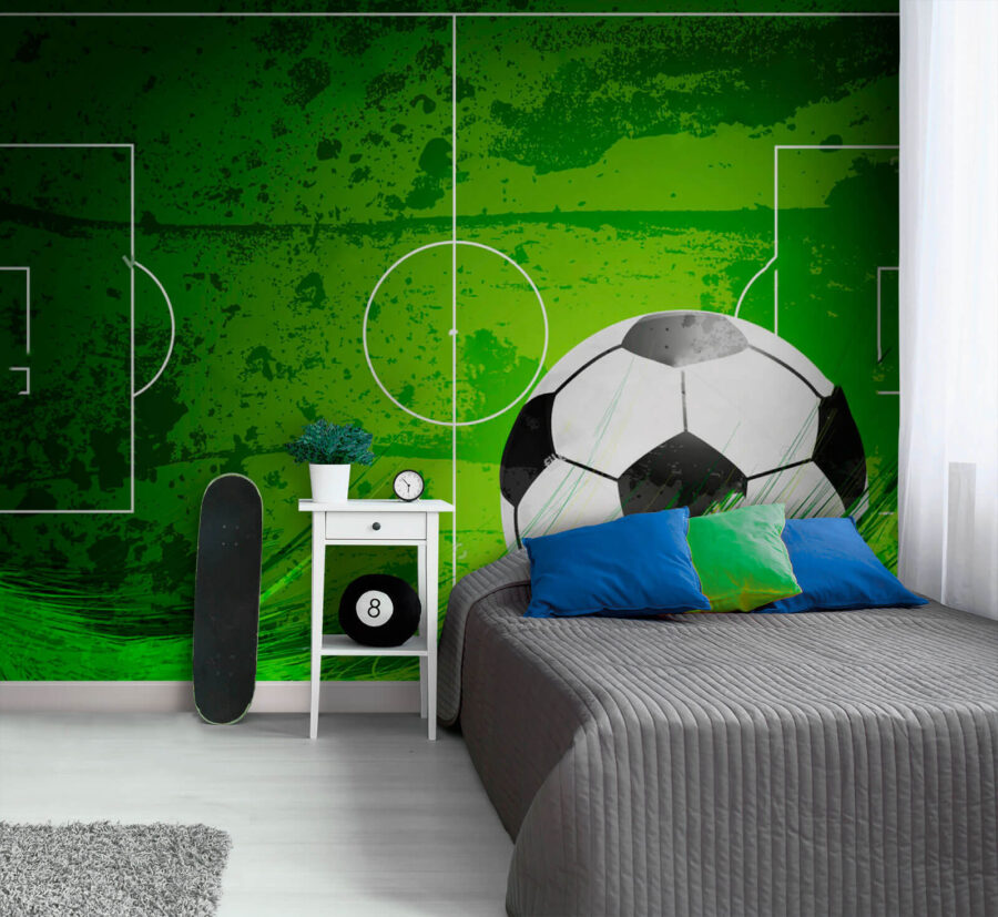 Football ball on a green field