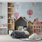 Wall mural Group of buildings with hot air balloons