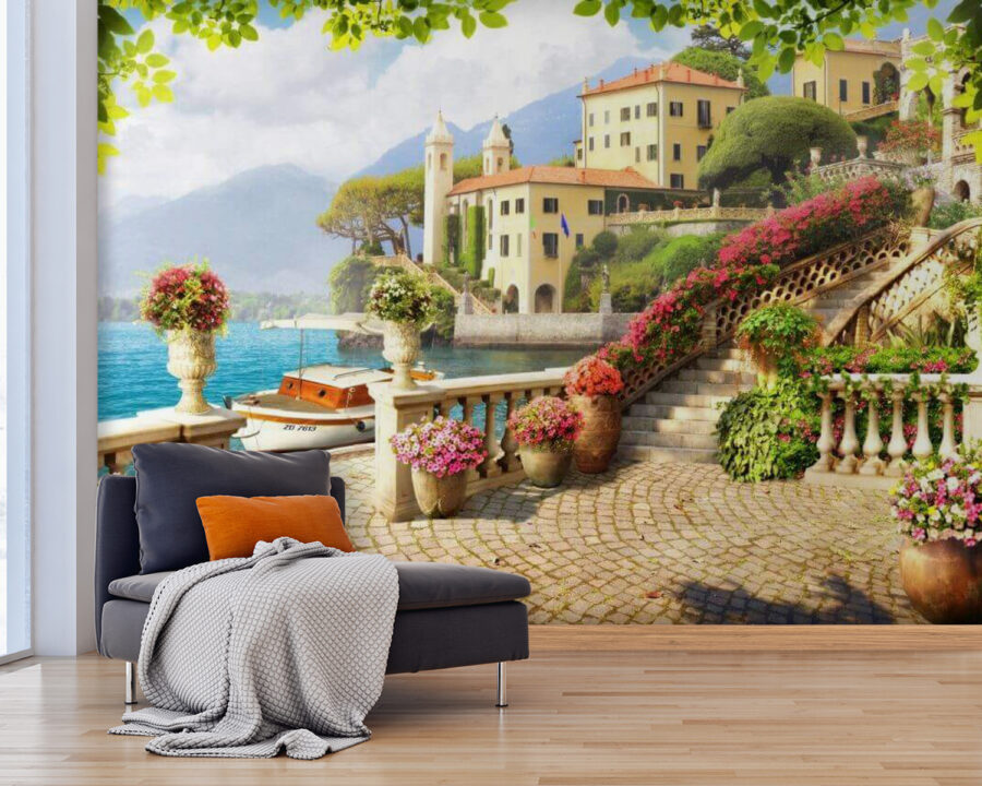 Stone walkway with stairs and flowers on the side of the water