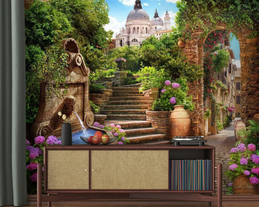 Stone path with a fountain and stairs and flowers