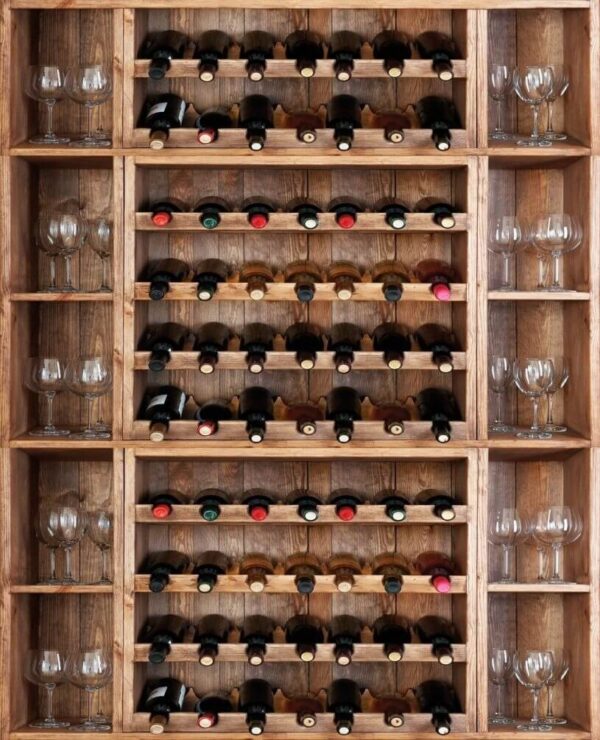 Wine bottles and glasses on a shelf