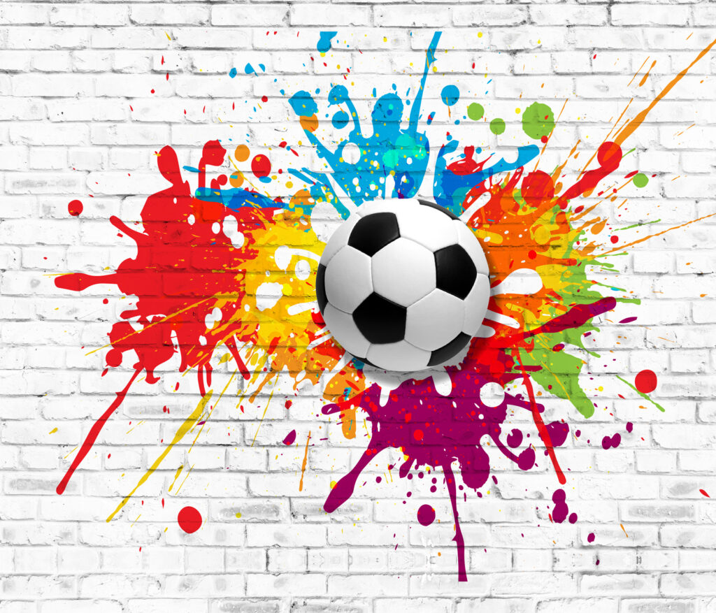 Football ball on a brick wall