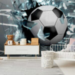 Wall murals Football ball breaking through glass