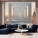 Wall murals Long walkway with pillars and a city in the background