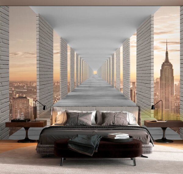 Long walkway with pillars and a city in the background Long walkway with pillars and a city in the background