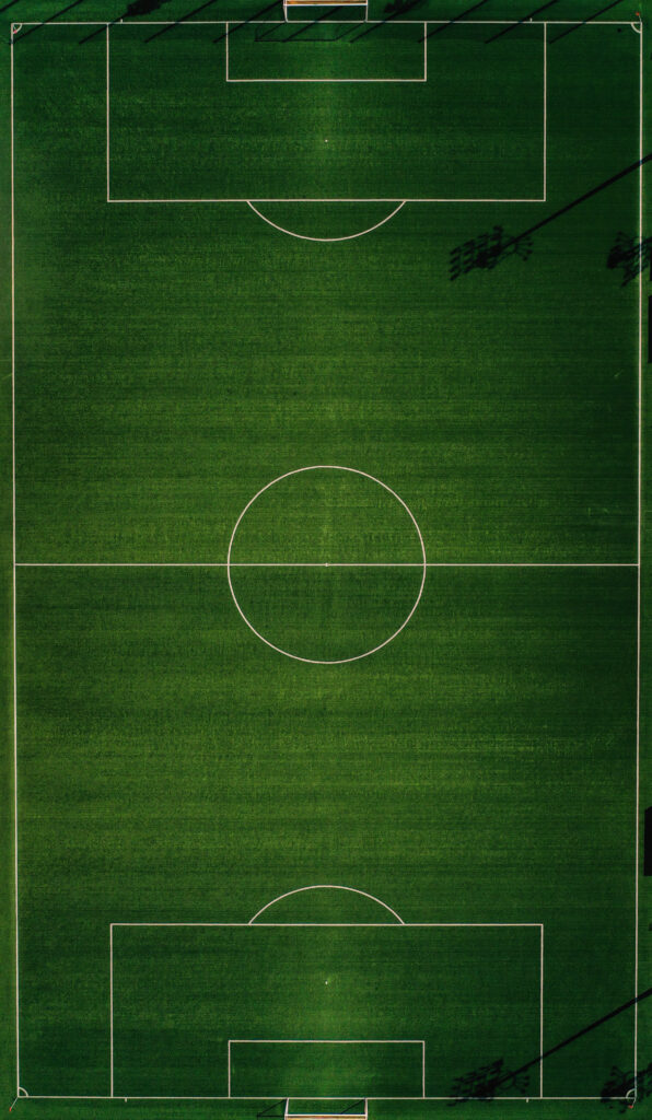 Football field with a white circle Football field with a white circle