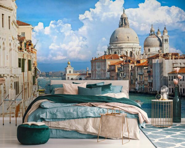 A water way with boats and buildings in the background with Grand Canal in the background