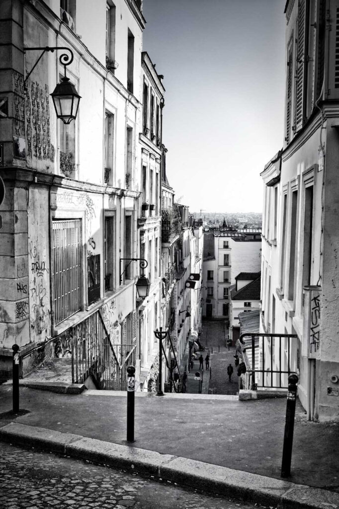 Street with buildings and a street light Street with buildings and a street light