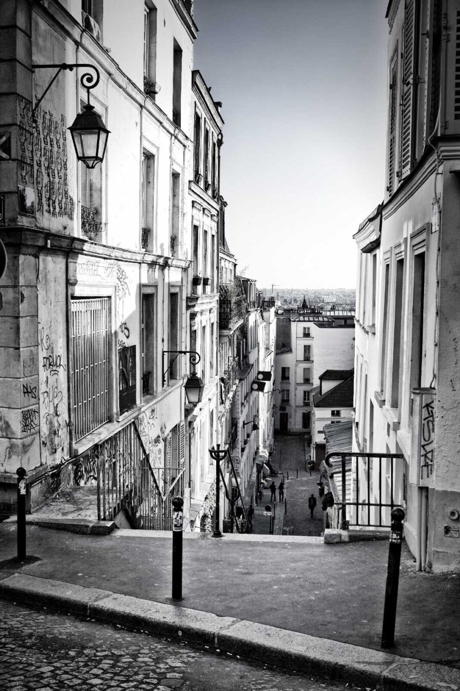 Street with buildings and a street light Street with buildings and a street light
