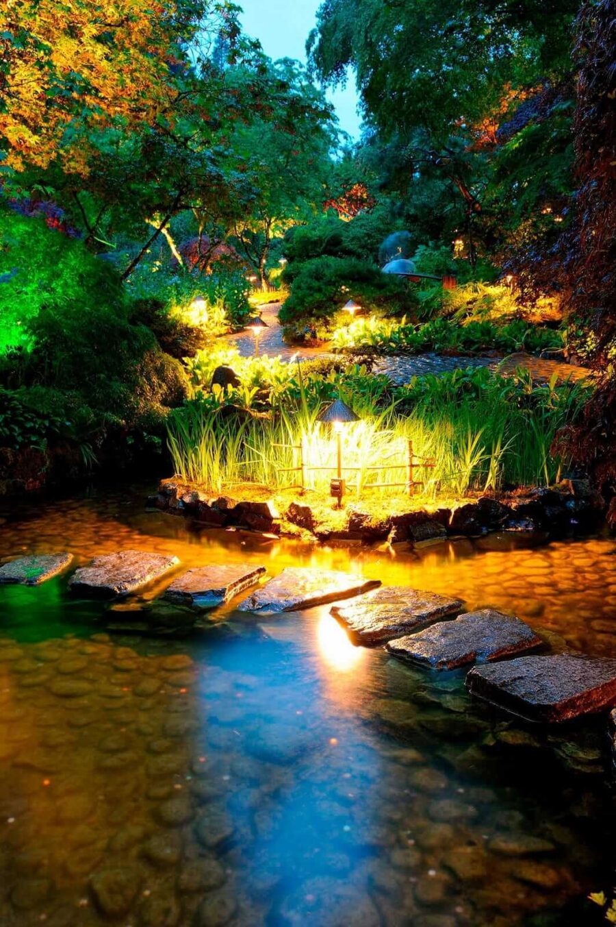 Stone path in a pond with lights