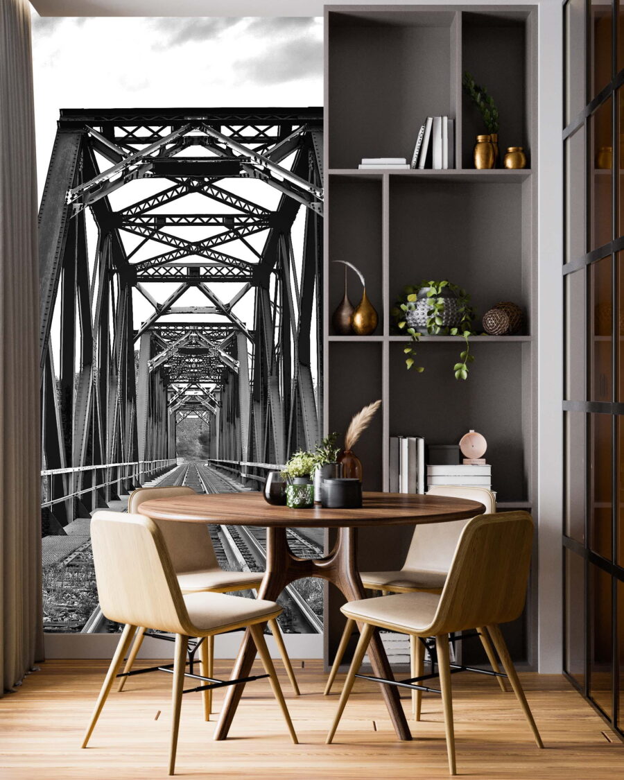 Train tracks going through a bridge