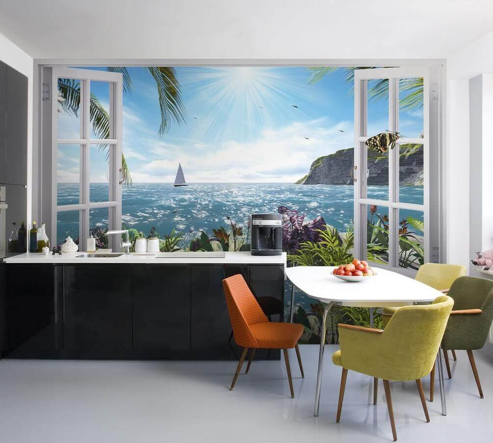Window with a view of the ocean and a sailboat
