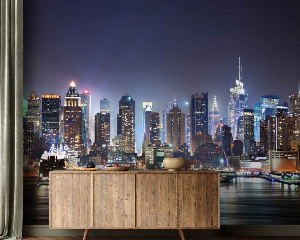 City skyline at night with lights reflecting on water City skyline at night with lights reflecting on water