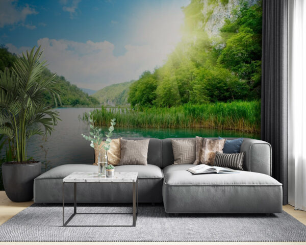 Body of water with grass and trees around it Body of water with grass and trees around it