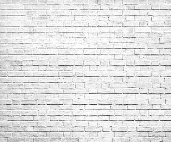 White brick wall with many small bricks White brick wall with many small bricks