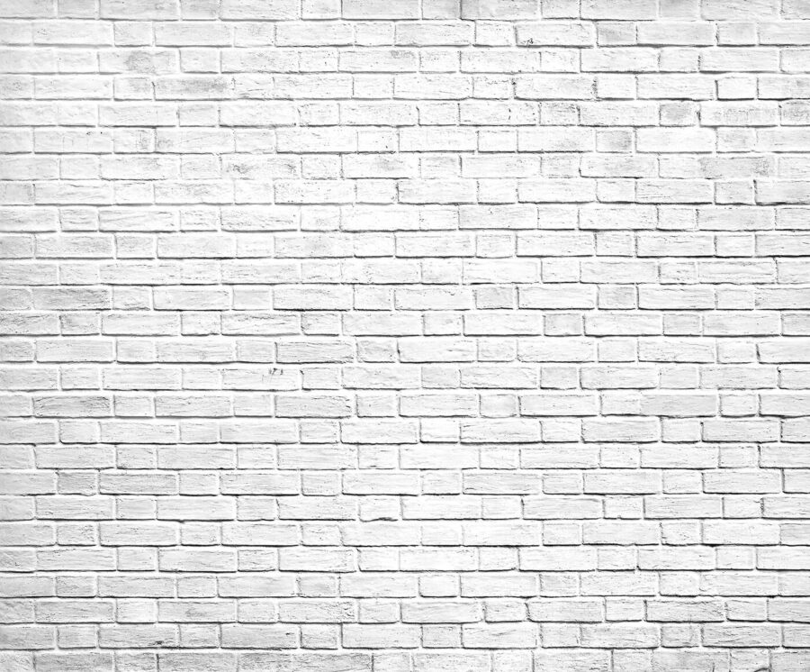 White brick wall with many small bricks