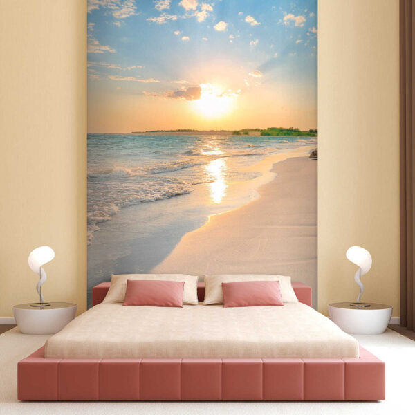 Beach with waves and a sunset Beach with waves and a sunset