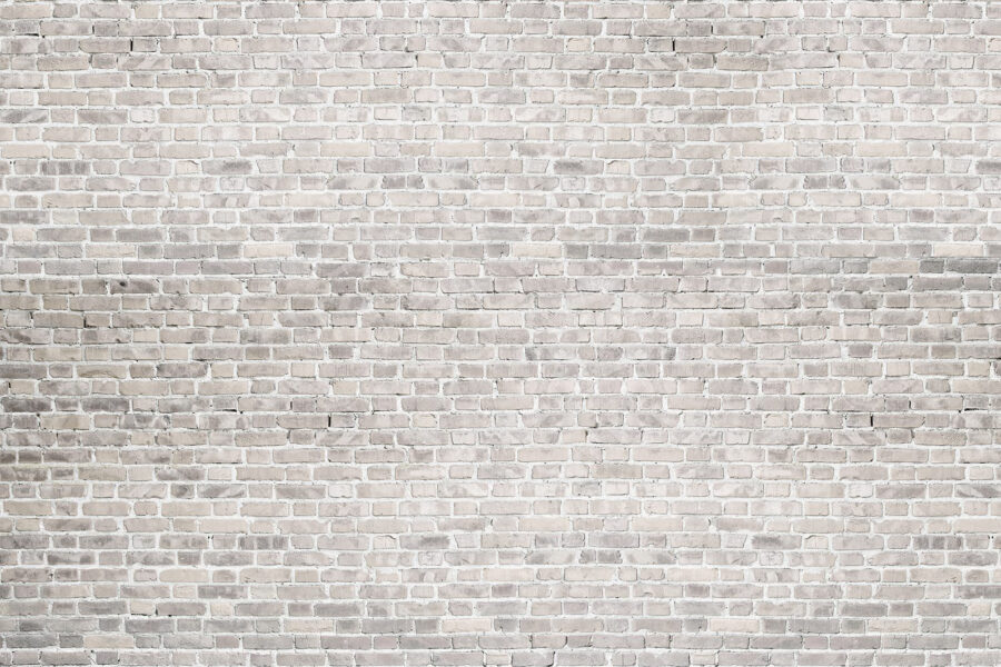 White brick wall with grey bricks