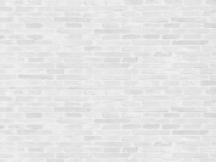 White brick wall with many rectangular bricks