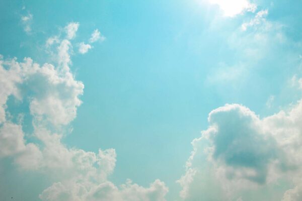 Blue sky with clouds and sun Blue sky with clouds and sun