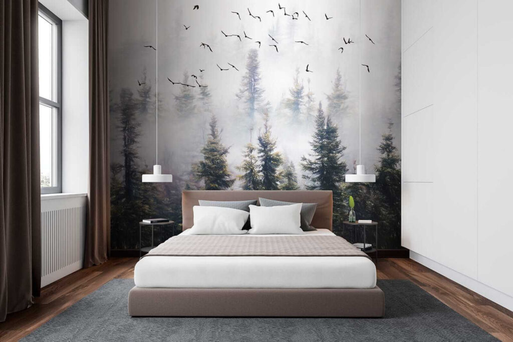 Birds flying in the sky over trees