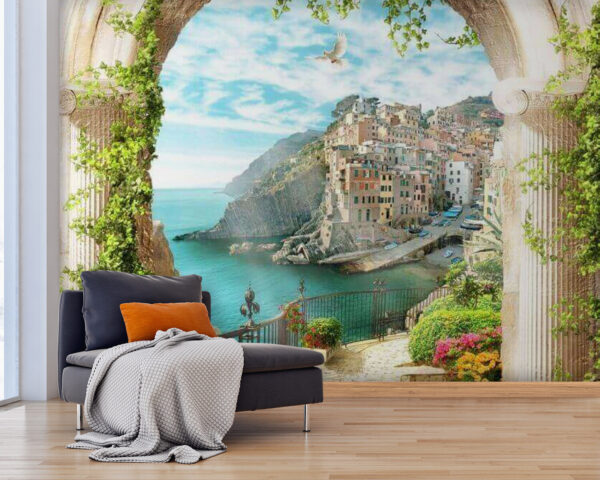 Stone archway with a view of a town and water Stone archway with a view of a town and water