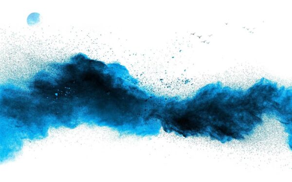 Blue powder explosion on a white background Blue powder explosion on a white background