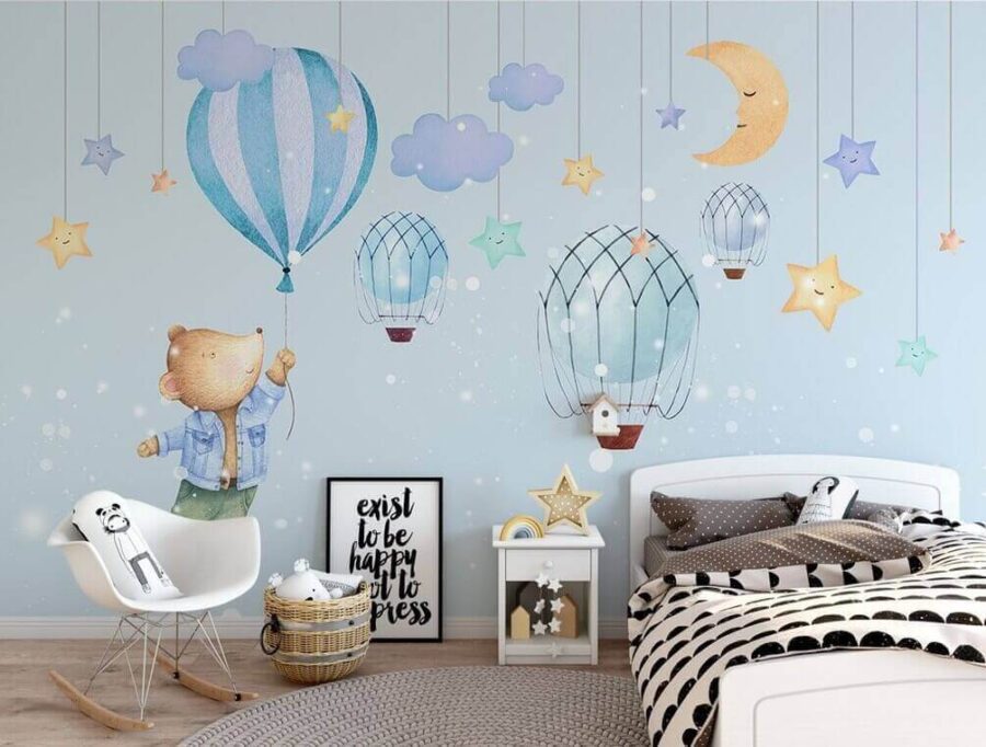 Cartoon bear holding a balloon