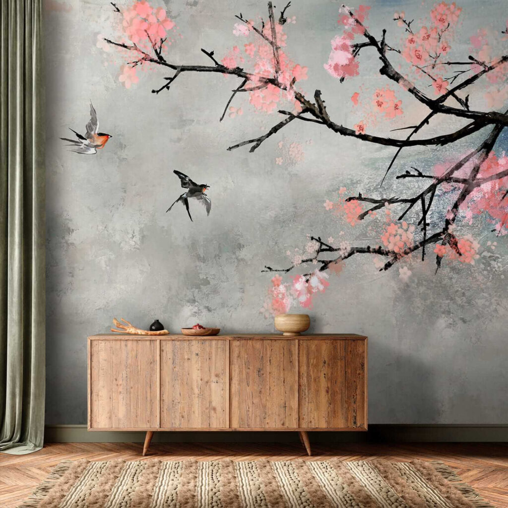 Tree branch with pink flowers and birds flying Tree branch with pink flowers and birds flying