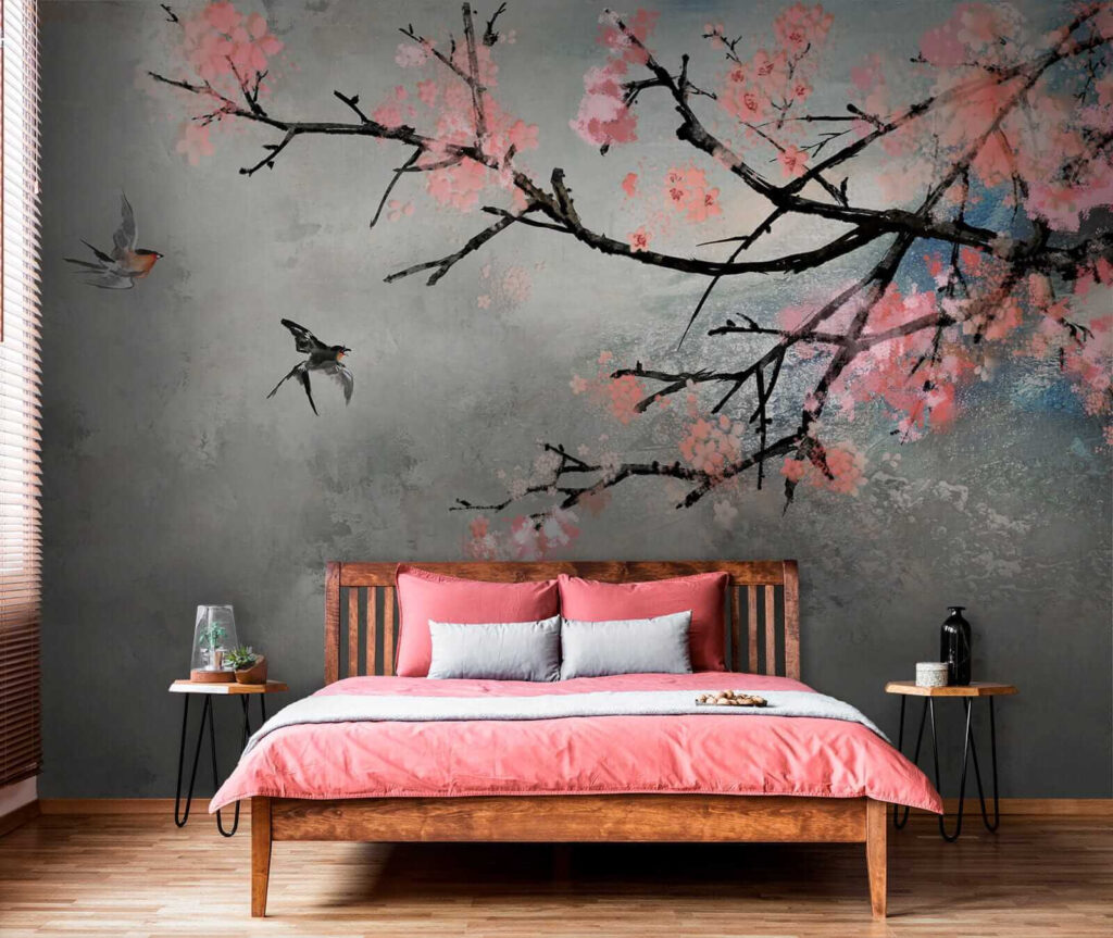 Tree branch with pink flowers and birds flying Tree branch with pink flowers and birds flying