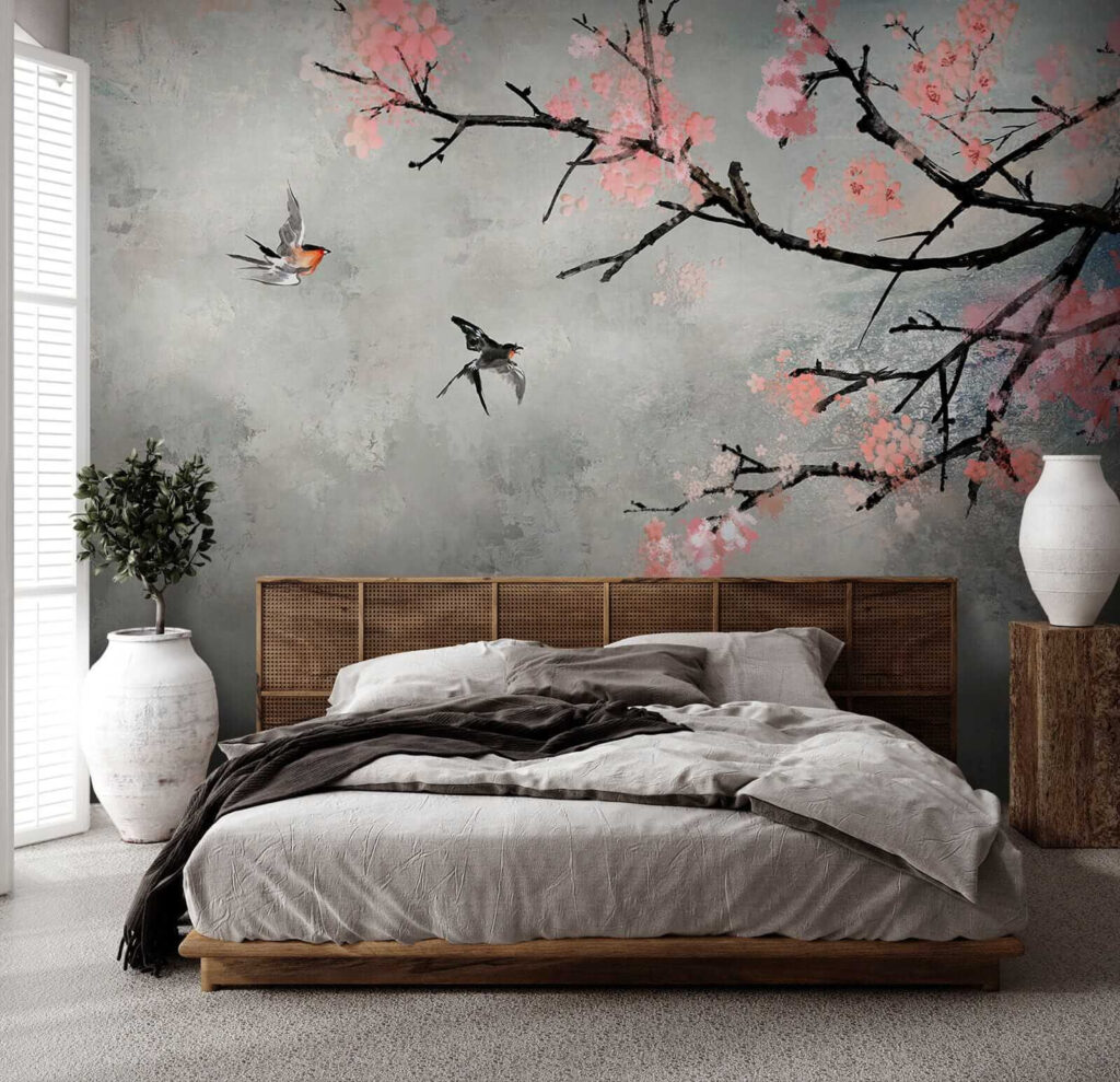 Tree branch with pink flowers and birds flying Tree branch with pink flowers and birds flying