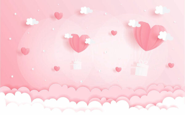 Pink paper cutout of hot air balloons and clouds Pink paper cutout of hot air balloons and clouds