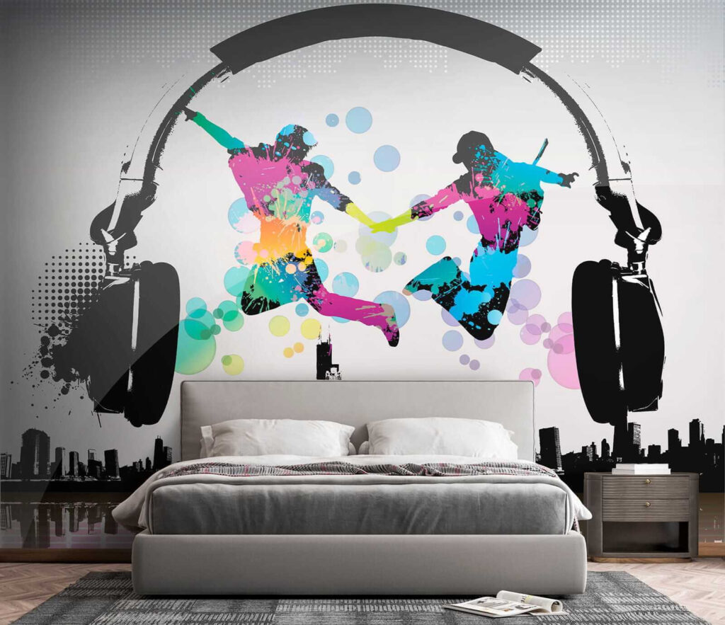 Couple of people jumping in the air with headphones