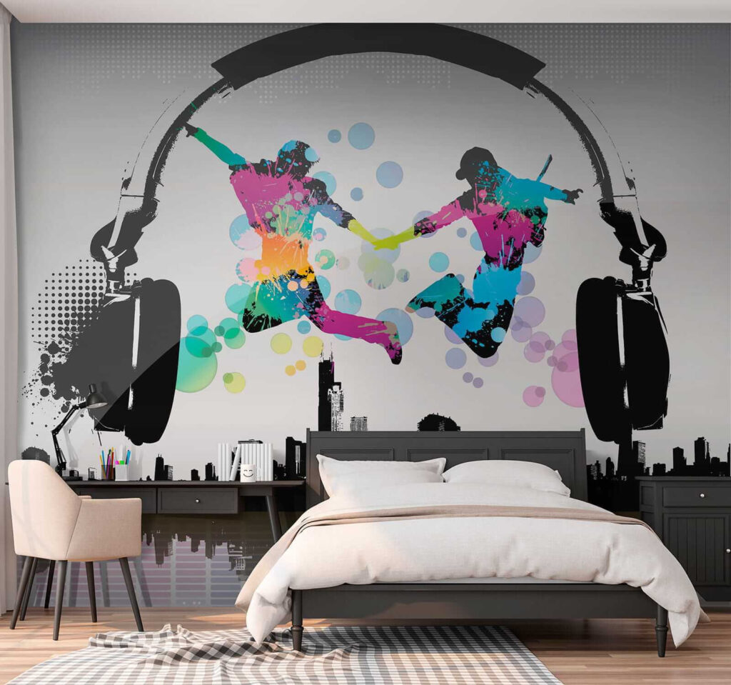 Couple of people jumping in the air with headphones