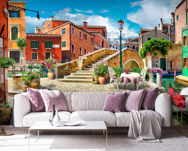 Patio with a table and chairs and a fountain in front of a building Patio with a table and chairs and a fountain in front of a building