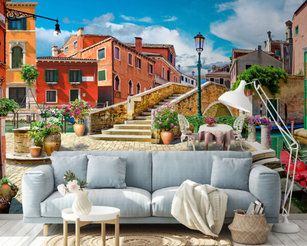 Patio with a table and chairs and a fountain in front of a building Patio with a table and chairs and a fountain in front of a building
