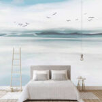 Wall murals Birds flying over a body of water