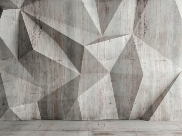 A concrete wall with a triangular pattern A concrete wall with a triangular pattern