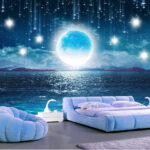 Painting of a baby angel Wall murals Moon over water with stars and clouds