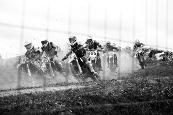 Group of people on dirt bikes Group of people on dirt bikes