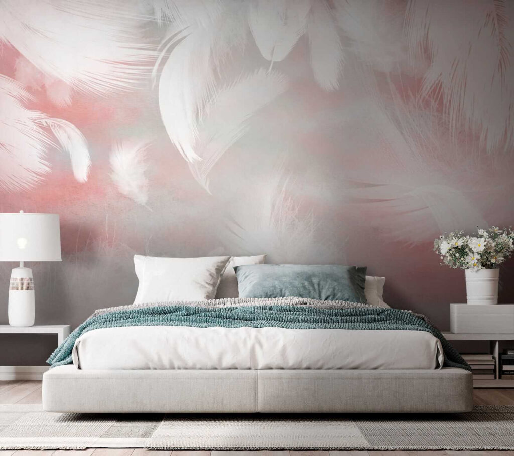 White feathers on a pink background