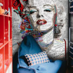 Wall murals Woman with red lips and flowers