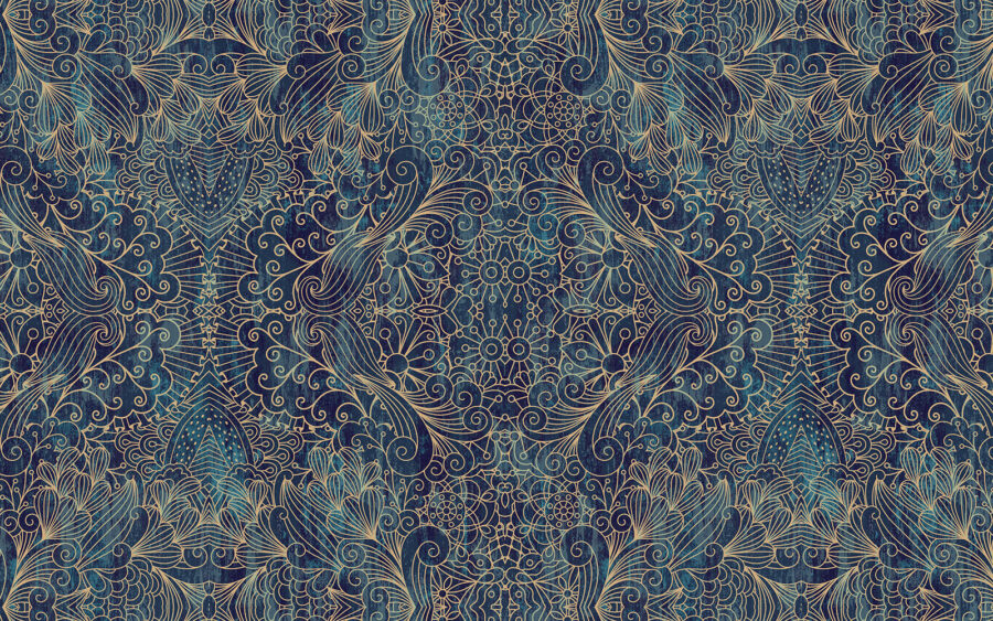 Intricate blue symmetrical floral design. Intricate blue symmetrical floral design.